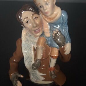 Porcelain Figurine of Parent and Child